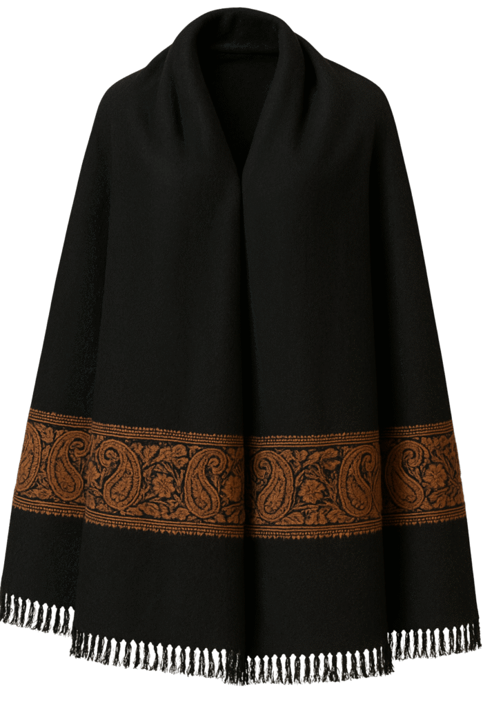 Elegant shawl with a soft fabric and contrasting ginger-colored border, neatly draped to highlight its classic design.