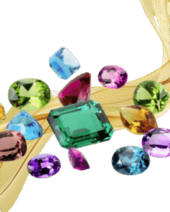 Collection of colorful cut gemstones including emerald, sapphire, amethyst, and topaz displayed on golden fabric