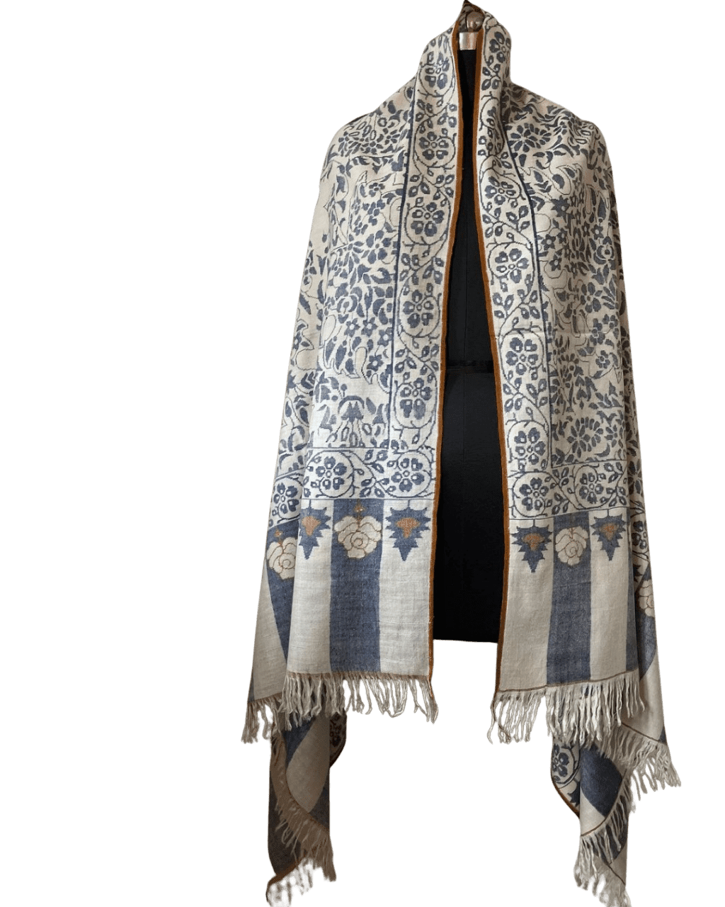 Handcrafted Qalamkar Wool Shawl with Traditional Geometric Border Handmade Qalamkar shawl in beige wool with traditional geometric border and fringed edges, displayed on a mannequin.