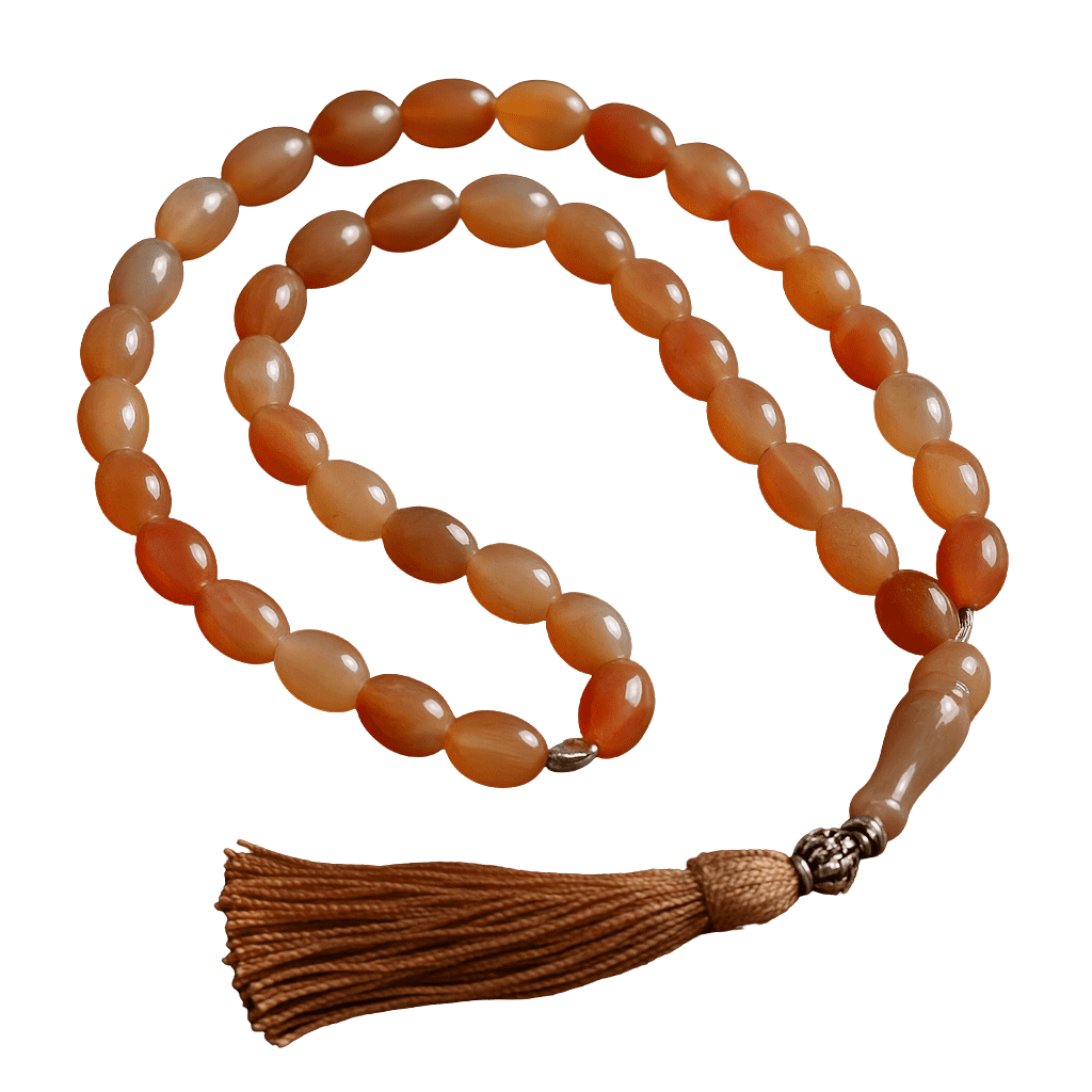 Haqeeq Tasbeeh – Premium Gemstone Prayer Beads Handcrafted Haqeeq tasbeeh with polished gemstone beads and a decorative tassel, arranged neatly on a soft background